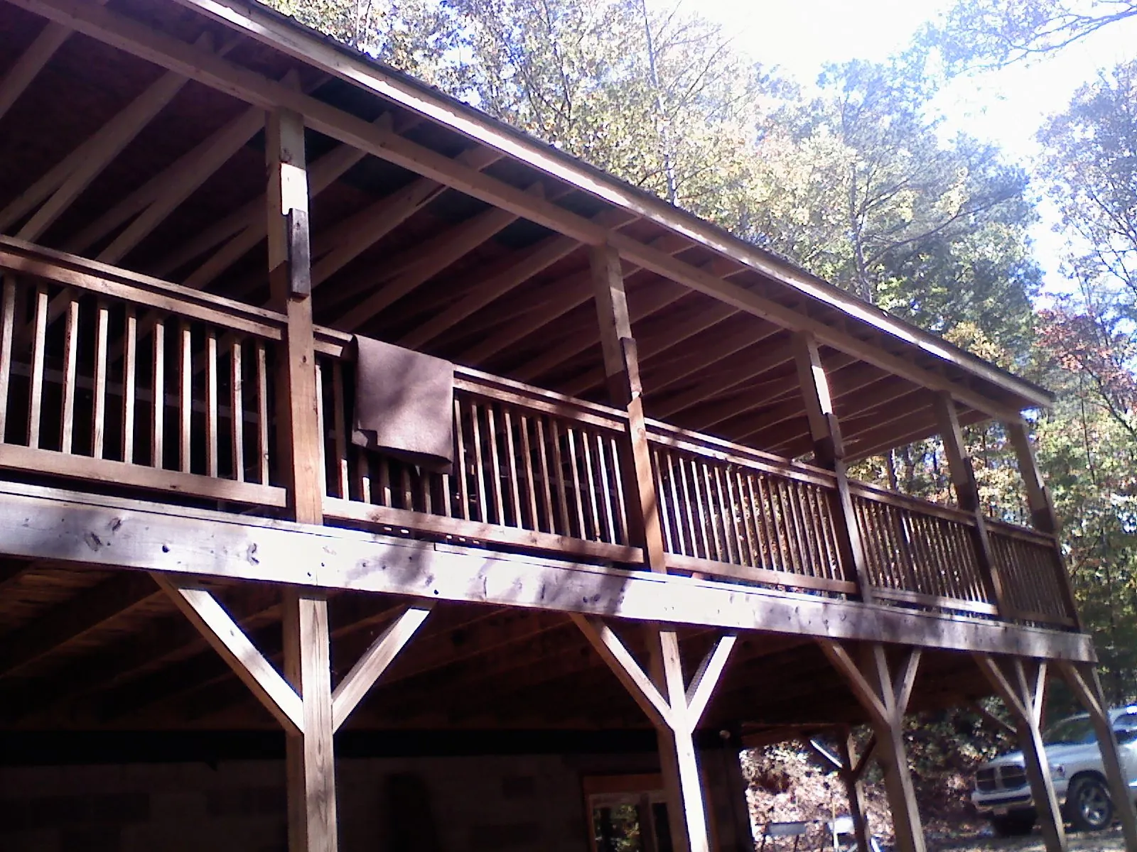 Timber framing under a new elevated porch and deck — Roof Leak Repair in Volant by Roofing Brothers